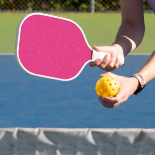 Pink textured surface with subtle swirling pattern pickleball paddle