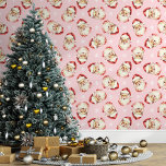 Pink Vintage Santa Claus Christmas Wallpaper<br><div class="desc">Bring the magic of the holidays into your home with this pink vintage Santa Claus Christmas wallpaper. Featuring charming illustrations of Santa's cheerful face and delicate snowflakes against a pink background, this design adds a festive and nostalgic touch to any room. Perfect for creating a cosy and merry atmosphere, this...</div>