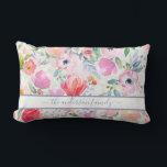 Pink watercolored florals family name script lumbar cushion<br><div class="desc">Romantic, bohemian, boho style. Soft, feminine watercolored flowers in pink, green and peach colours with green foliage on a white background. Personalise and add your name or family name written with a lavender coloured modern hand lettered script with swashes. To keep the swashes only delete the sample name, leave the...</div>