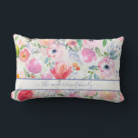 Pink watercolored florals family name script lumbar cushion<br><div class="desc">Romantic, bohemian, boho style. Soft, feminine watercolored flowers in pink, green and peach colours with green foliage on a white background. Personalise and add your name or family name written with a lavender coloured modern hand lettered script with swashes. To keep the swashes only delete the sample name, leave the...</div>