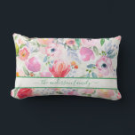 Pink watercolored florals family name script lumbar cushion<br><div class="desc">Romantic, bohemian, boho style. Soft, feminine watercolored flowers in pink, green and peach colours with green foliage on a white background. Personalise and add your name or family name written with a green coloured modern hand lettered script with swashes. To keep the swashes only delete the sample name, leave the...</div>
