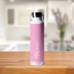 Pink white custom name script water bottle<br><div class="desc">Pink,  girly background.  Personalise and add your name.   White handwritten style script.</div>