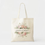 Pink White Floral Wedding Tote Bag<br><div class="desc">The wedding couple's names are surrounded by top and bottom borders of white hydrangea flowers and pink roses. There is a variety of leaves and branches that give it a very modern and chic vibe.</div>