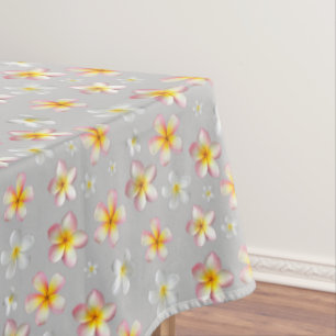 Pink & White Plumeria Flowers on Light Grey Tablecloth