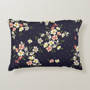 pink yellow and brown small flowers with green lea decorative cushion