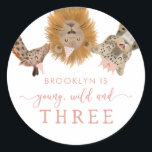 Pink Young Wild and Three Safari Birthday Party Classic Round Sticker<br><div class="desc">Cute safari theme kid's 3rd birthday party favour sticker featuring hand drawn illustration of a giraffe,  leopard,  rhino,  lion,  elephant,  and zebra with pink flowers,  crowns,  and party hats. The text at the top says "XX is young wild and three" Great for a girl's party!</div>