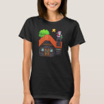 Pixel Art Santa on Rooftop Christmas House Scene T-Shirt<br><div class="desc">Festive pixel art of Santa Claus standing on a snowy rooftop holding a tree,  beside a cosy brick house under a glowing star – perfect holiday vibes!</div>