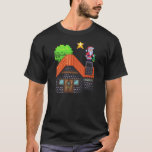Pixel Art Santa on Rooftop Christmas House Scene T-Shirt<br><div class="desc">Festive pixel art of Santa Claus standing on a snowy rooftop holding a tree,  beside a cosy brick house under a glowing star – perfect holiday vibes!</div>