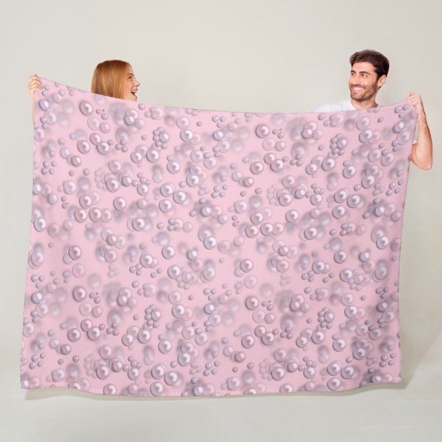 Placers of white-pink pearls on pink velvet fleece blanket (In Situ)