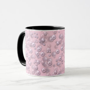 Placers of white-pink pearls on pink velvet mug