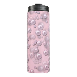 Placers of white-pink pearls on pink velvet thermal tumbler