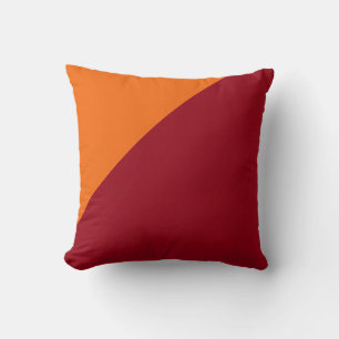 Plain dark red and orange background cushion