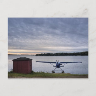 Plane at sunset postcard