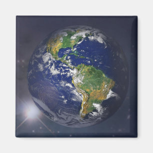 Planet earth rising above the sun in space magnet