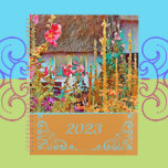 Planner<br><div class="desc">A pretty garden, overflowing with colourful flowers and foliage, partially hides a sweet Irish cottage with a thatched roof. Old fashioned hollyhocks, on their tall spikes, are abundant among the flowers. The beautiful colour pallet consists of rich golden yellow, aqua blue, dark and light pink, violet, bright emerald and sage...</div>