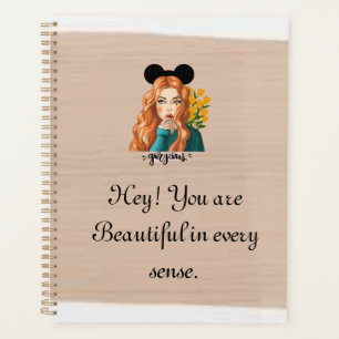 Planners with motivational quotes.