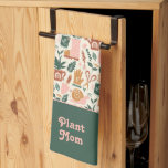 Plant Mum Cute Gardening Gift Tea Towel<br><div class="desc">This Personalised Garden Design Kitchen Towel is a wonderful addition to any kitchen. This towel is not just practical but also brings a personalised touch to your cooking area. The garden design is printed beautifully on the towel, showcasing vibrant colours and intricate details that are sure to impress. Additionally, with...</div>