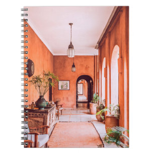 PLANTERS WITH PLANT NEAR AREA RUG INSIDE ROOM NOTEBOOK