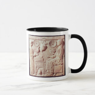 Plaque of a woman offering gifts to a seated mug