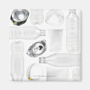 Plastic bottles, cups and alluminum cans shot on magnet