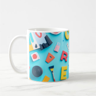 Plastic letters arranged artistically on a dark bl coffee mug