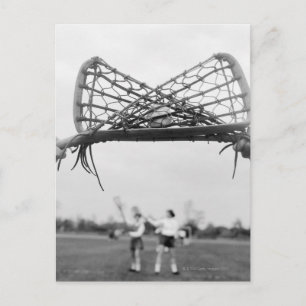 Play starts in a lacrosse team with the draw.Two Postcard