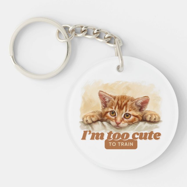 Playful Cat “I'm Too Cute to Train” Key Ring (Front)