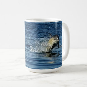 Playful Common Dolphins Porpoising Through Ocean Coffee Mug