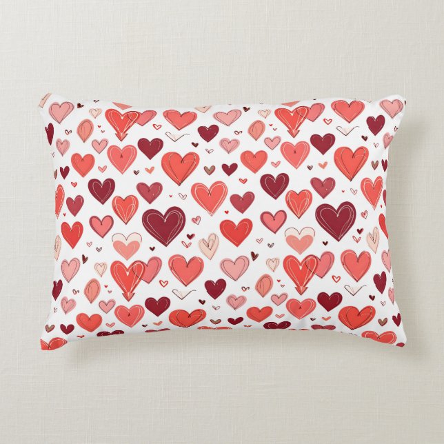 Playful hand drawn red hearts pattern on white  decorative cushion (Front)