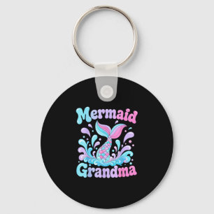Playful mermaid tail with water splashes design key ring