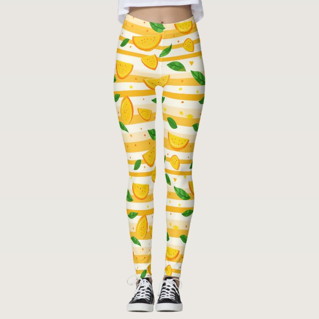 Playful Orange Slice Pattern with Green Leaves Leggings (Front)