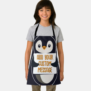 Playful penguin with a sign for your message apron
