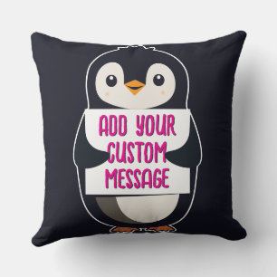 Playful penguin with a sign for your message cushion