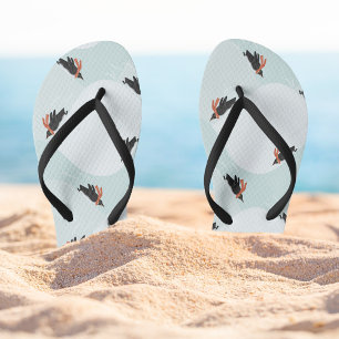 Playful Penguins Sliding on Snow Pattern Flip Flops