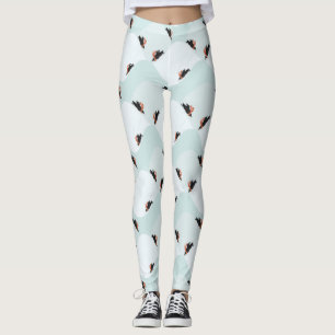 Playful Penguins Sliding on Snow Pattern Leggings
