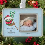 Playful Sloth First Christmas Photo Silver Plated Framed Ornament<br><div class="desc">Cute little sloth dressed in a holiday sweater wearing a santa hat hanging out on a holly branch baby's First Christmas Ornament. . Matching items available in our shop.</div>