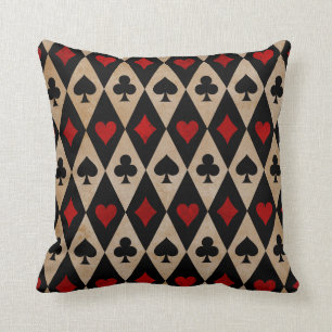 Playing Card Suits on Black and Tan Cushion