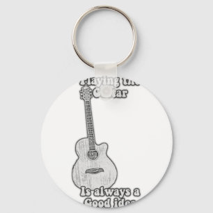 Playing the guitar is always a good idea. B & W Key Ring