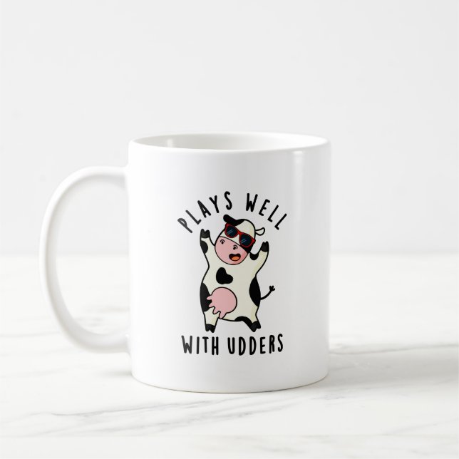 Plays Well With Udders Funny Cow Pun Coffee Mug (Left)