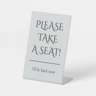 "PLEASE TAKE A SEAT!" PEDESTAL SIGN