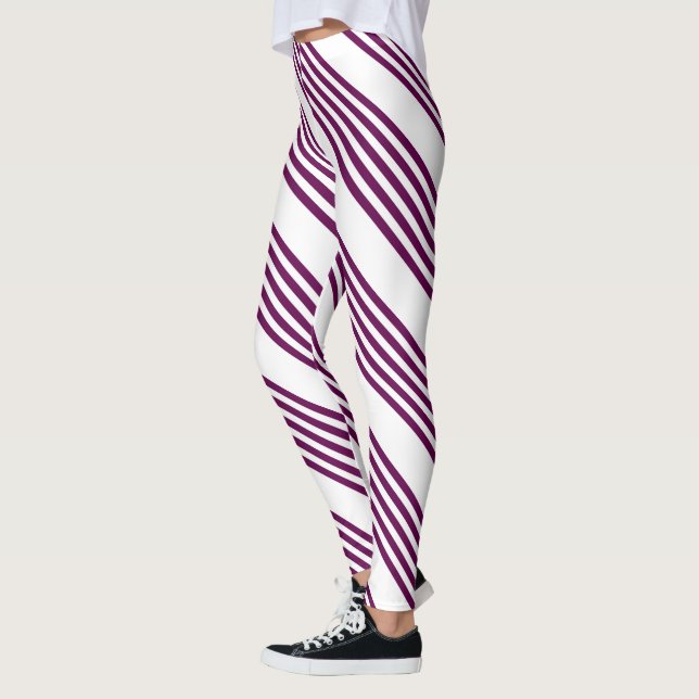 Plum and white five stripe pattern leggings (Left)