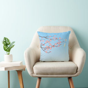Plum Blossom and Glass Wind Chime on Light Blue Cushion