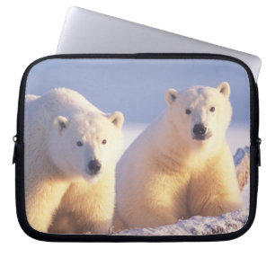 Polar bear sow with cub on pack ice laptop sleeve