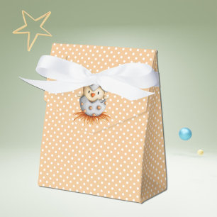Polka dot orange favour box with a baby bird