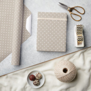 Polka dots on a textured beige wrapping paper