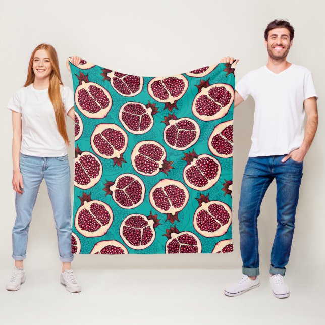 Pomegranate slices on turquoise fleece blanket (In Situ)