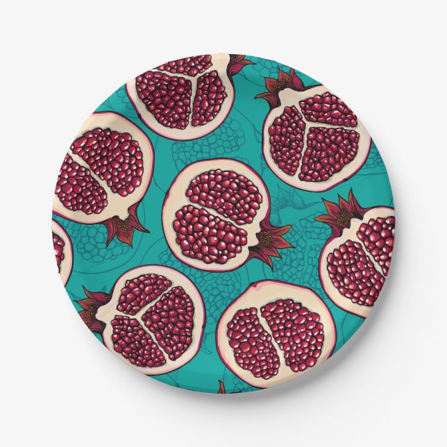 Pomegranate slices on turquoise paper plate (Front)