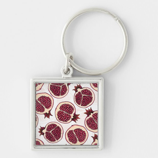 Pomegranate slices on white key ring (Front)