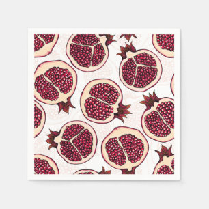 Pomegranate slices on white napkin