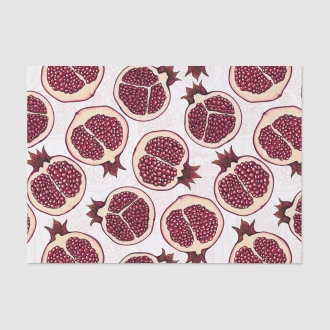 Pomegranate slices on white tissue paper (Front)